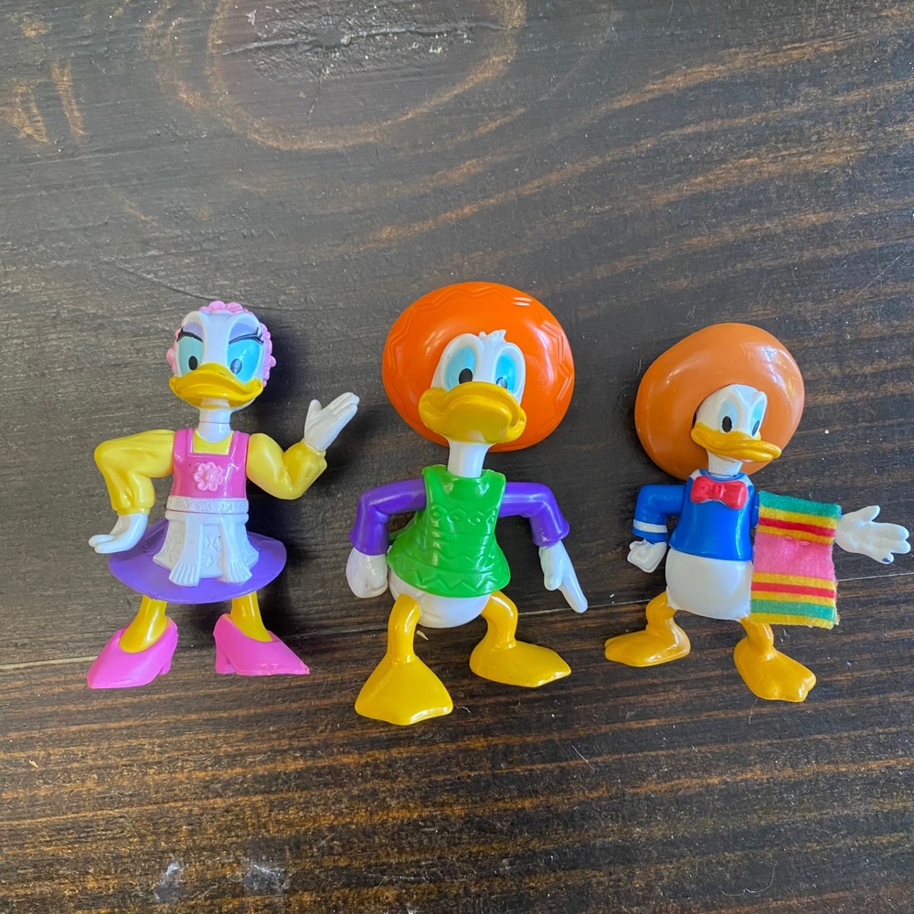 Vintage Disneyโ EPCOT Center Mexico Donald Daisy Duck PVC Figures Set of 3